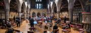 Audience and choir relax during the interval 2