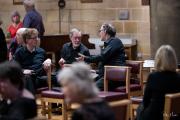Audience and choir relax during the interval 3